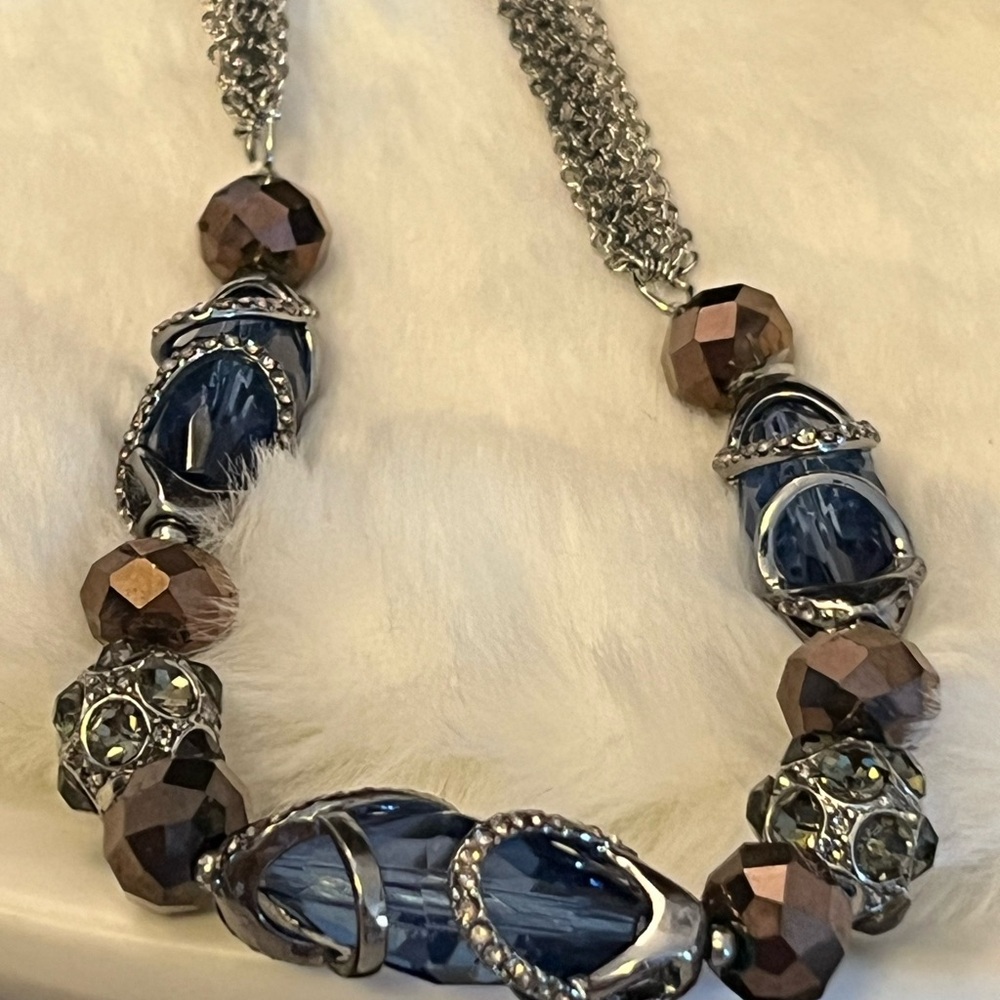 Vera Wang featuring blues, and browns beaded necklace